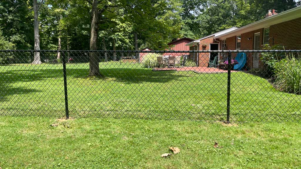 Chain Link Fence that is Black in Color