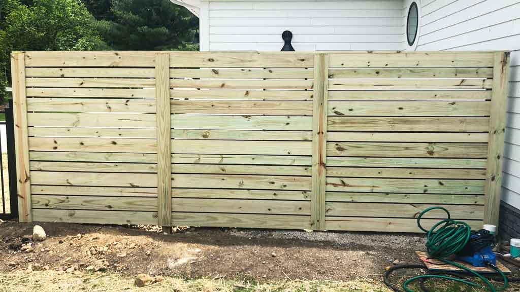 Treated privacy clearance fence