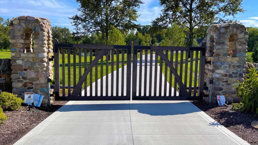 wooden double gate across driveway