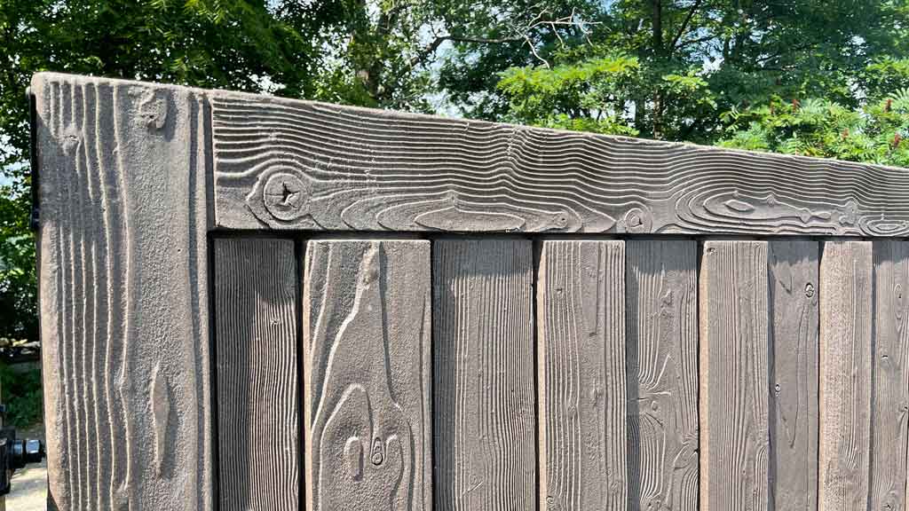 textured wood grain vinyl fence