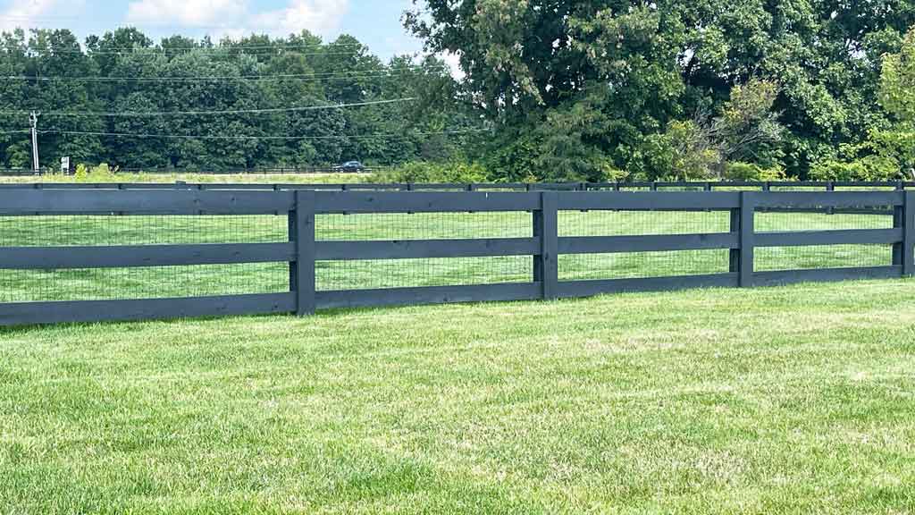 black post and rail fence