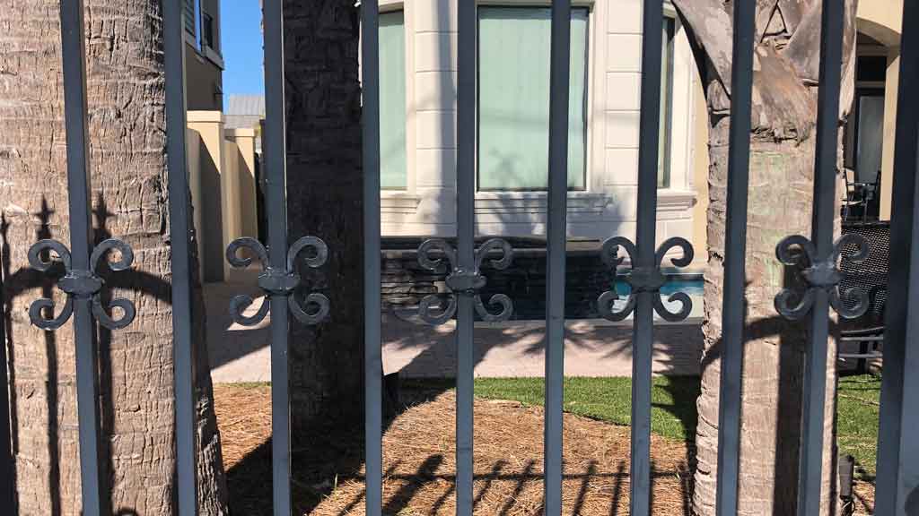 scrolls on a wrought iron fence