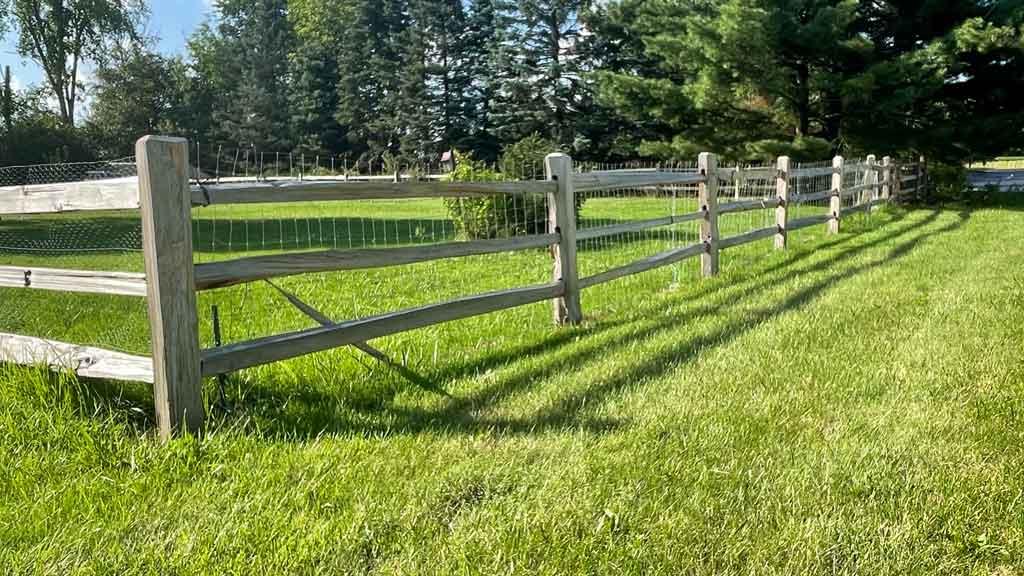cedar split rail fence with 3 rails