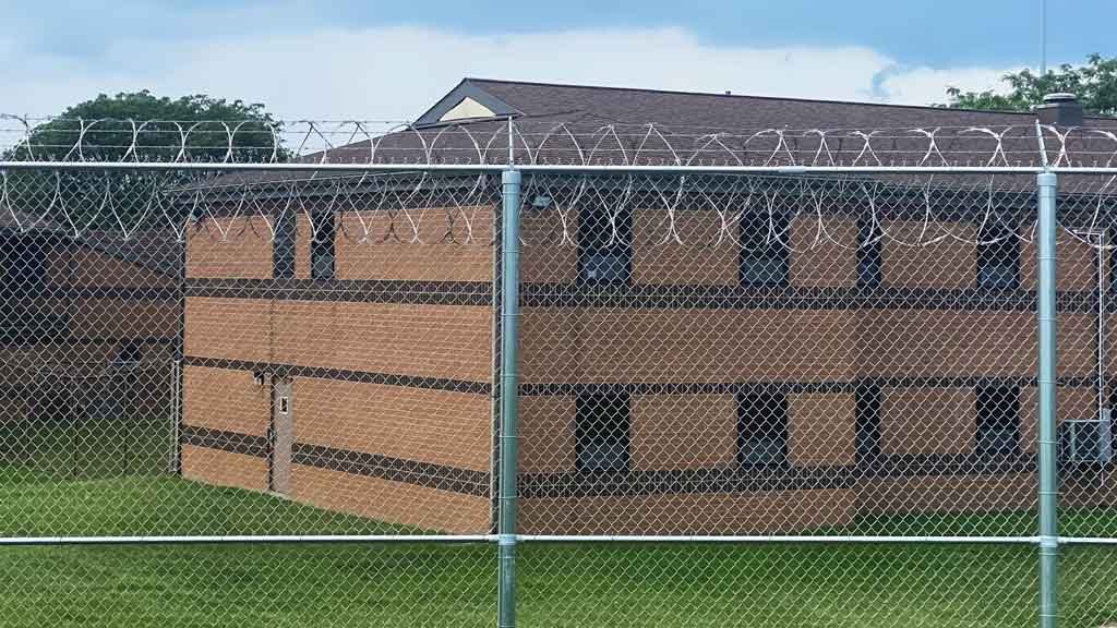 concertina wire on prison fence