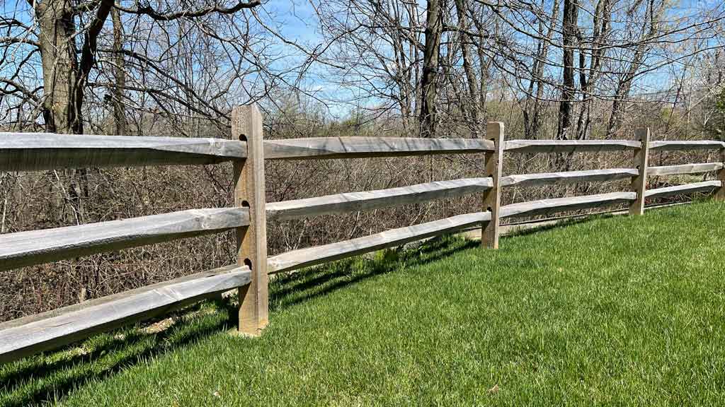 3 rail split rail fence on farm