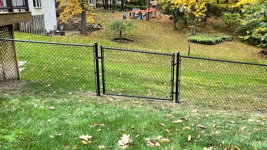 chain link gate on hill
