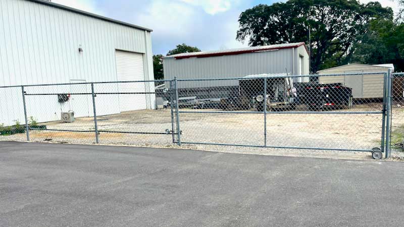 rolling gate in chain link fence