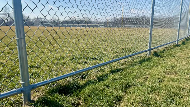 chain link fence with bottom rail