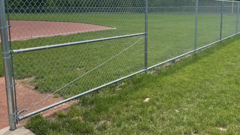 chain link fence with bottom rail