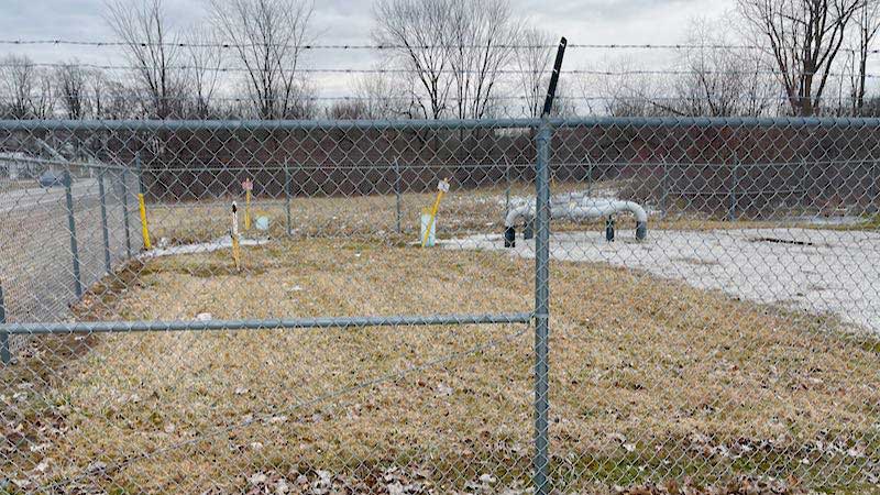 chain link fence with barbed wire